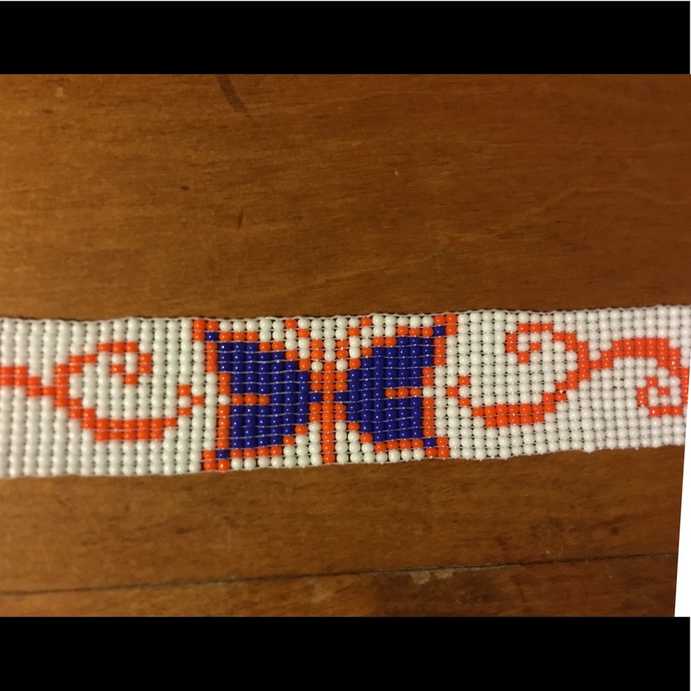 Beaded butterfly bracelet with 2 in extension